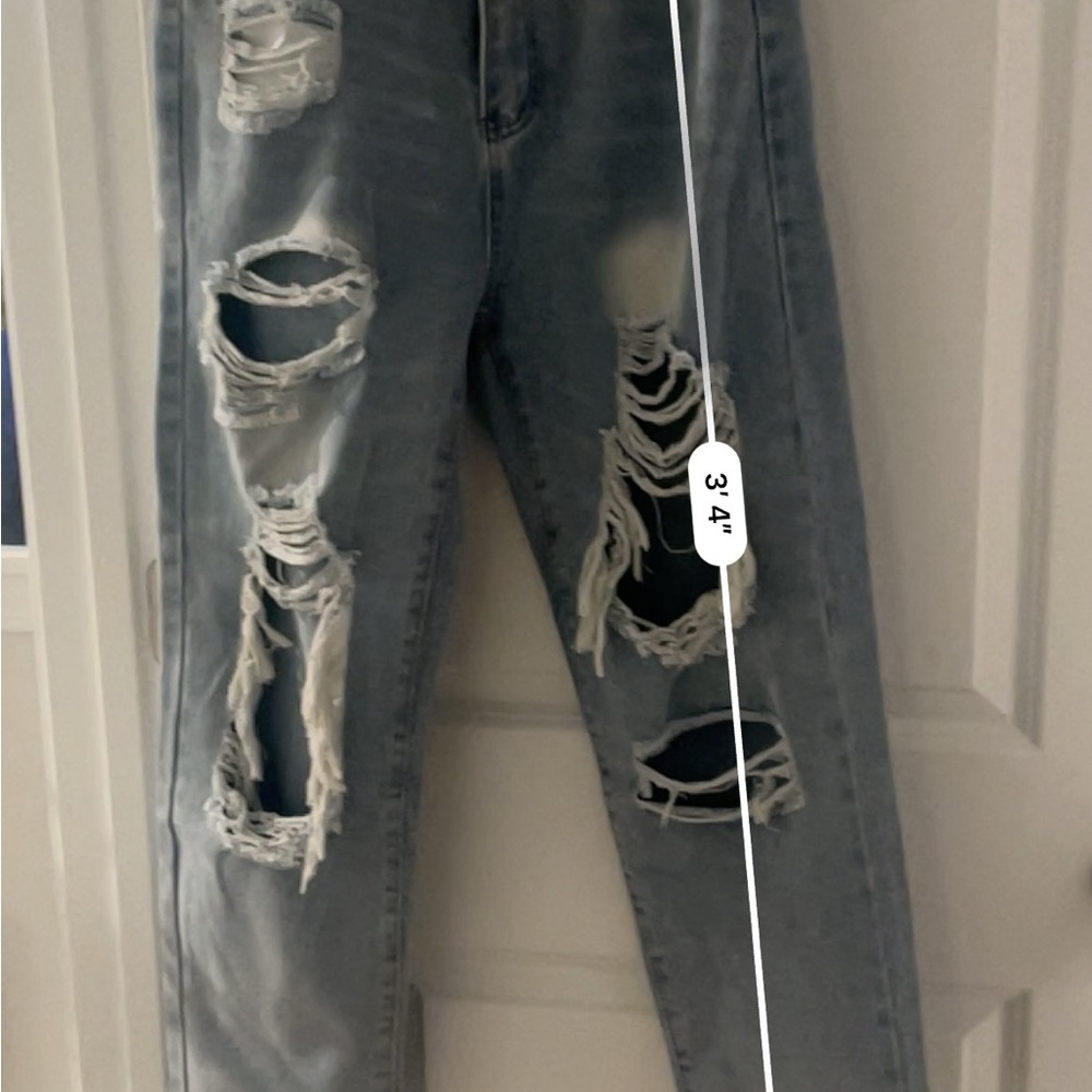 Distressed Light Blue Jeans